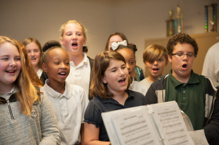 Children singing in a spiritual growth plan